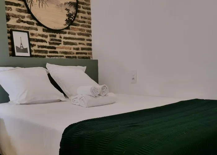 Апартаменты Les Relais Du Capitole - D'hotes